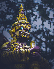 dark tone, The golden spinning image has a bokeh on the back.