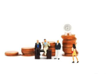 Miniature people:  Businessmen standing with coins stack, Finance, investment and growth in business concept.