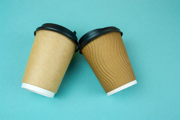 disposable paper cups on a blue background