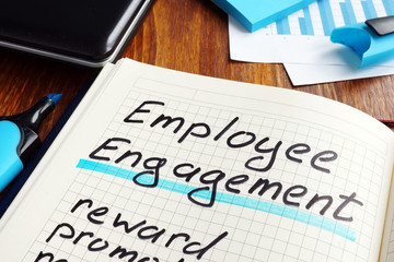 Employee engagement plan on a book. Engage workers.