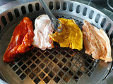 Top view of fresh meat on grill. Barbecue