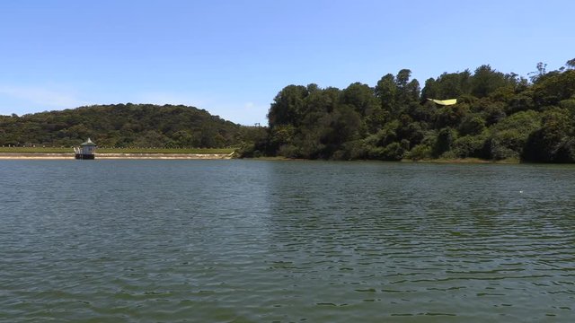 Lake near road in Horton plains national park, Sri Lanka