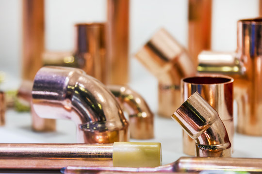 copper pipes of different diameter and sizes and adapters for carrying out plumbing works
