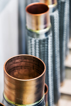 copper pipes of different diameter and sizes and adapters for carrying out plumbing works