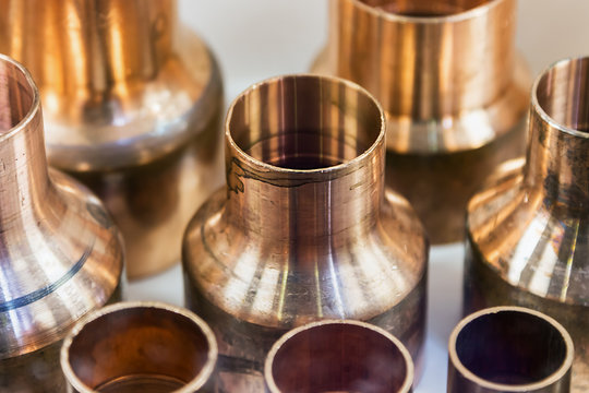 copper pipes of different diameter and sizes and adapters for carrying out plumbing works