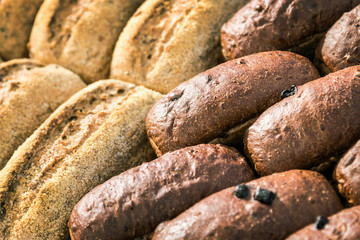 freshly baked bread with a delicious crust. background of bakery products