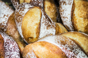 freshly baked bread with a delicious crust. background of bakery products
