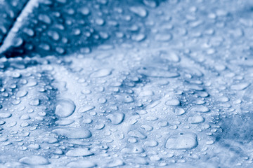 Large drops of water on textiles with a waterproof effect