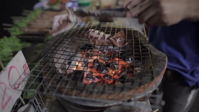 grilling squid in khaosan road