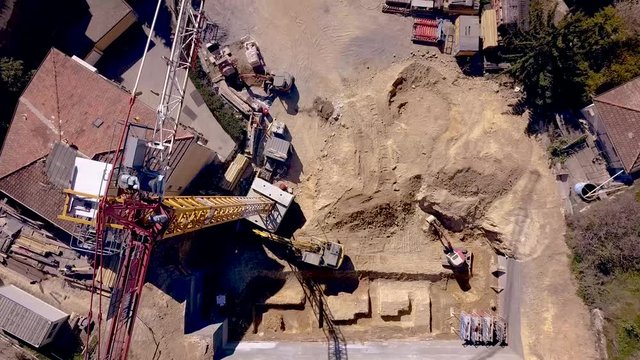 sky View above construction site, machenery work into the zone.