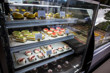 Cheescake - Matcha cream on the top and matcha bisquit on the bottom between Mango gelatin