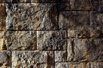 Steinmauer in grau gelb als Bildhintergrund