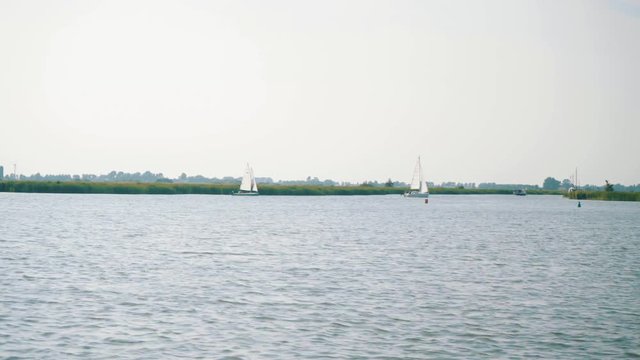 view on lake from ship in Friesland