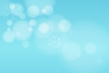 Blue winter background with snowflakes.