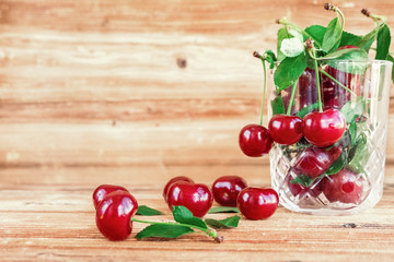 fresh cherry berries on wooden board