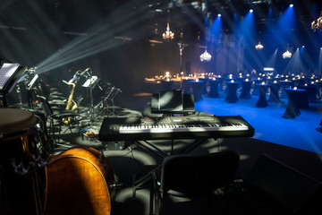 Empty stage and an event venue with instruments for the jazz band live show