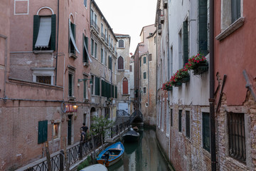 Fototapeta na wymiar Panoramic view of Venice canal with historical buildings and gondolas