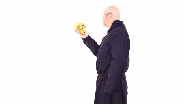 man in black hoodie with golden skul monologue - white screen