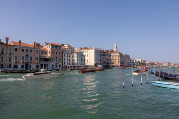 Panoramic view of Grand Canal (Canal Grande) with active traffic boats