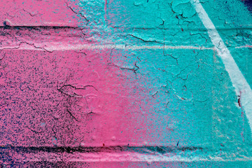 Graffiti painted on a brick wall texture.