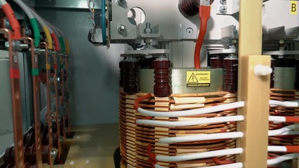 Control cabinet. Internal view of the transformer cabinet. copper parts and elements of electrical transformer starter. electrical transformer station
