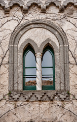 Fototapeta na wymiar Medieval window, adorned with column