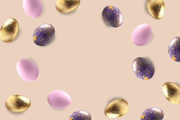 Frame made of Easter eggs on color background