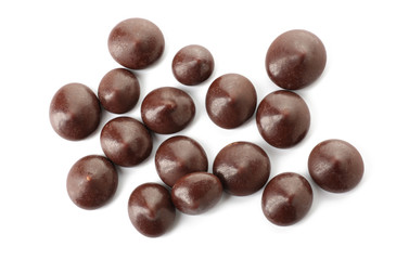 Delicious chocolate chips on white background