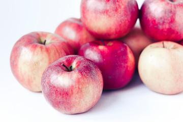 Fresh ripe red apples on white background, vegetarian concept.