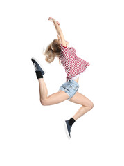 Young female dancer on white background