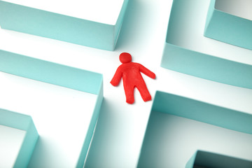 Figure of person is seeking way out of the maze, bureaucratic problems. Personal call