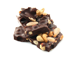 Tasty dark chocolate with nuts on white background