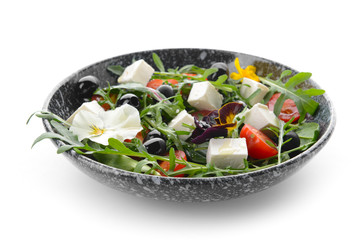 Plate with healthy salad on white background