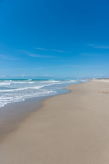 Fototapeta na wymiar Southern Mediterranean Italian Beach on a Sunny Day