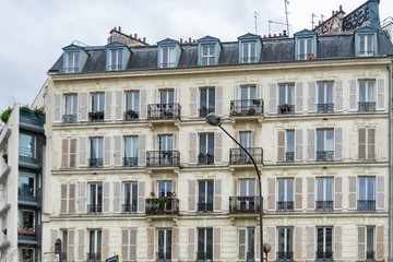 Fototapeta na wymiar Paris, beautiful building in the center, typical parisian facade in the Marais