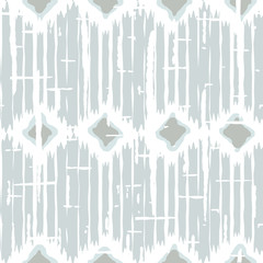 Ikat pattern vector. Geometric background with ethnic rug fabric texture and chevron shapes in neutral pastel colors.