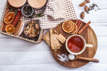 Cup of hot tea on white wooden table