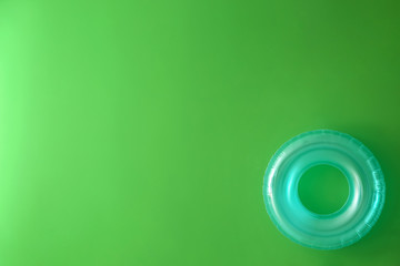 Inflatable ring on color background
