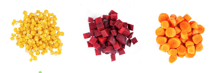 Heaps of different cut vegetables isolated on white background. Top view.