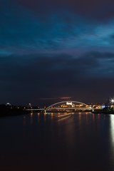 Fototapeta na wymiar Night Bratislava's landmarks, castle and bridges.