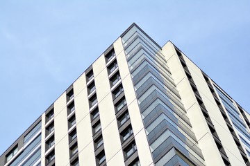 Fototapeta premium Multistory new modern apartment building. Stylish living block of flats.