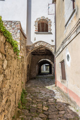 Fototapeta na wymiar Ancient Street and Archway in Southern Italy
