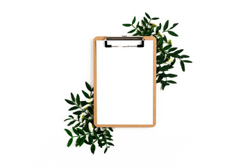 Clipboard mock up. Border frame made of chrysanthemum flowers and pistachios branches
