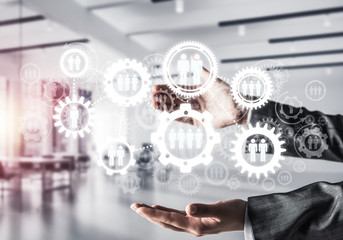 Cogwheels and gears mechanism as social communication concept