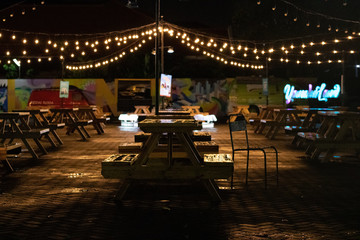 Table in Night under the light tail buld