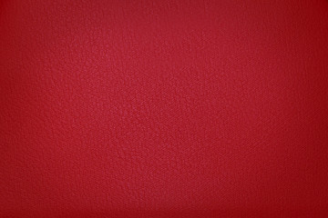 Bright red fabric texture with vignetting