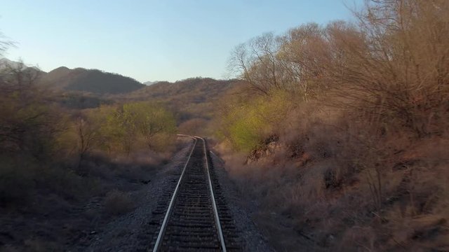 POV of the Cheep train passing through arid scenery