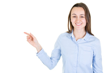 cute young woman pointing at copyspace looks in camera