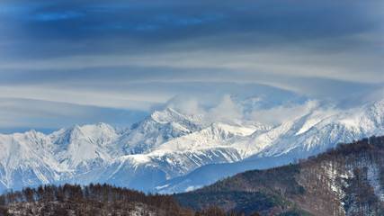 Fototapeta na wymiar Fagaras Mountains covered in snow in late Autumn