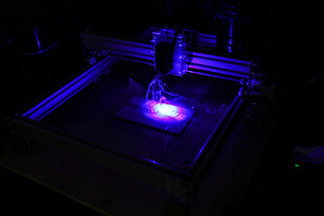 Laser engraving marking instrument in the dark.